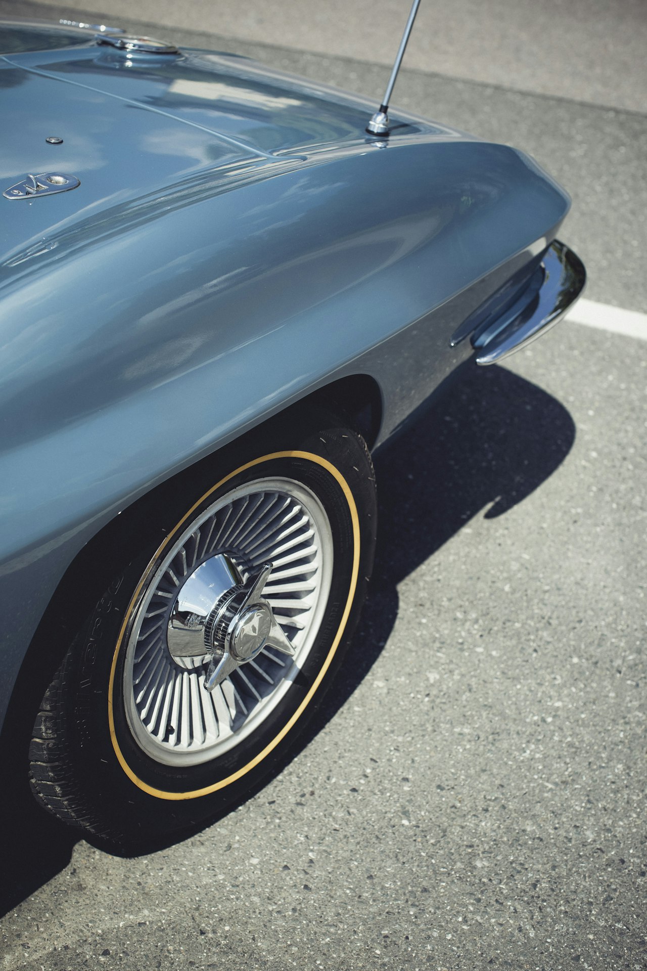 Chevrolet Corvette C2 Stingray convertible in metallic blue, front three-quarter view